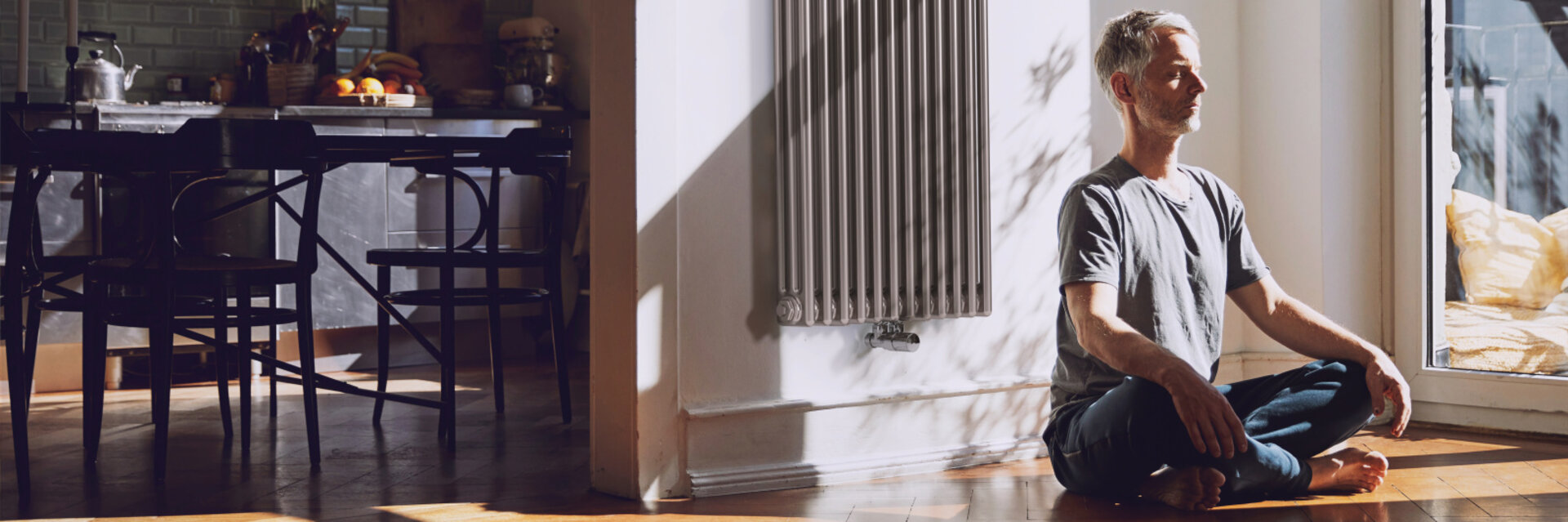 man meditates, old building flat, relaxed, charleston