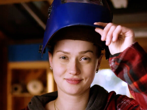 women wearing  a production helmet
