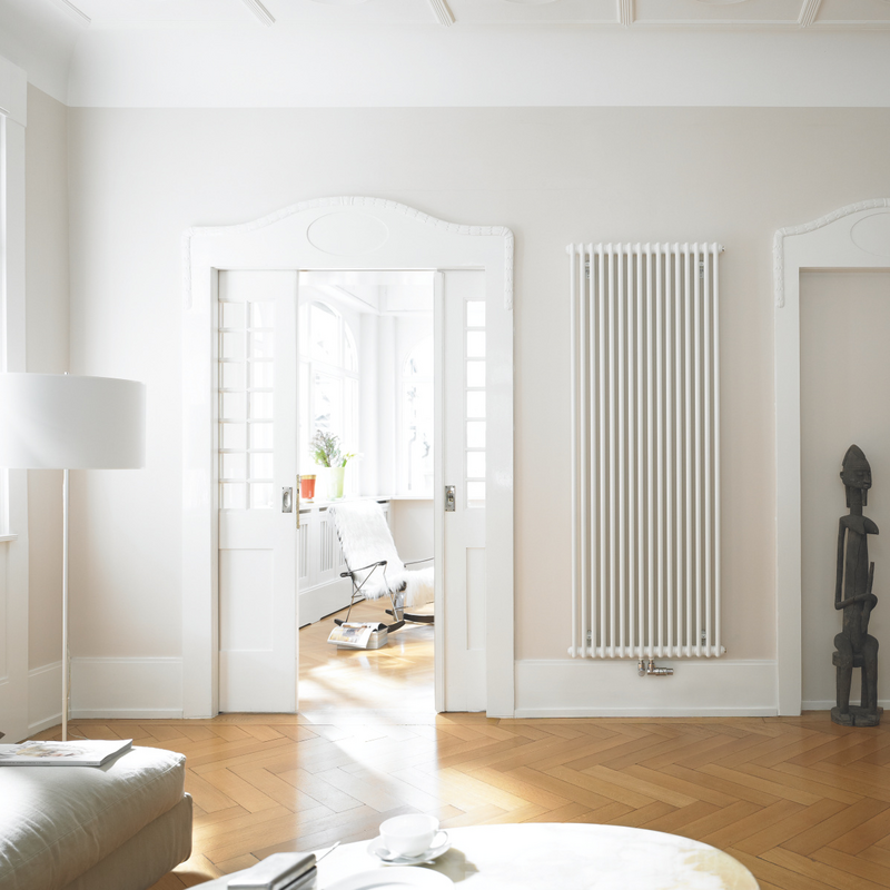 refurbished liviling room with an white zehnder charleston design radiator